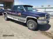 1998 Dodge 2500 with VIN 1B7KF23Z4WJ171365, listed as a Copart auction lot 55085915 with 222,954 mi miles and Clean title. Bid and sale history available at DreamBid. Image 4.