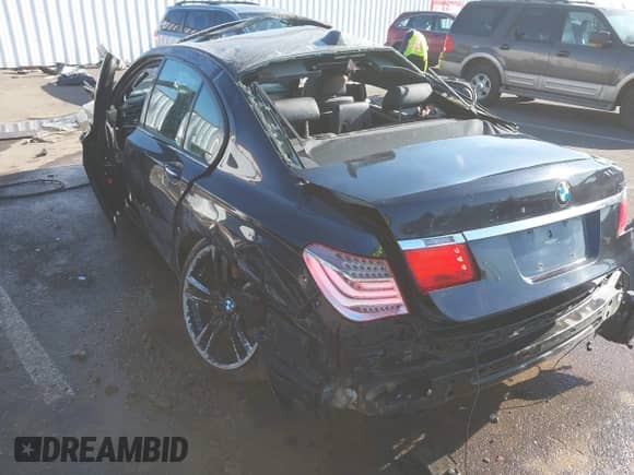 2012 BMW 7 Series 750i with VIN WBAKA8C55CCY37886, listed as a IAAI auction lot 42050003 with 86,722 mi miles and . Bid and sale history available at DreamBid. Image 6.