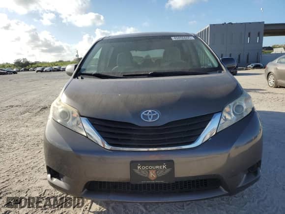 2011 Toyota Sienna LE with VIN 5TDKK3DC2BS026091, listed as a Copart auction lot 55224415 with 216,436 mi miles and Salvage title. Bid and sale history available at DreamBid. Image 5.