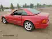 1992 Mercedes-Benz SL z VIN WDB1290661F061025, wystawiony jako Copart lot #71854695 z przebiegiem 158 674 mil mil oraz Szkoda całkowita • Salvage title. Historia ofert i sprzedaży dostępna na DreamBid. Obrazek 2.