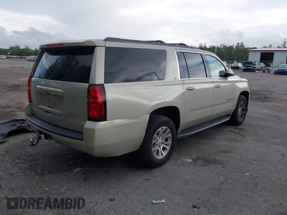 2016 Chevrolet Suburban LT z VIN 1GNSCHKCXGR282232, wystawiony jako IAAI lot #42650483 z przebiegiem 143 325 mil mil oraz . Historia ofert i sprzedaży dostępna na DreamBid. Obrazek 4.