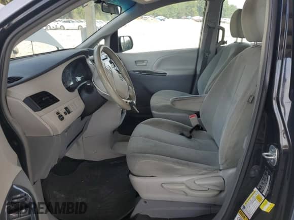 2014 Toyota Sienna L with VIN 5TDZK3DC0ES513289, listed as a Copart auction lot 69385975 with 340,709 mi miles and Clean title. Bid and sale history available at DreamBid. Image 7.