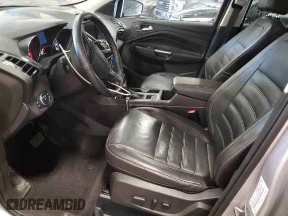 2017 Ford Escape Titanium with VIN 1FMCU9JD1HUA79587, listed as a Copart auction lot 84209285 with 61,058 mi miles and Clean title. Bid and sale history available at DreamBid. Image 7.