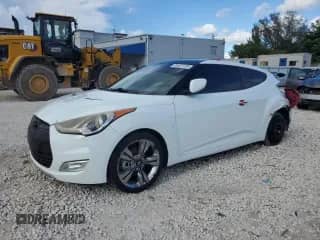 2014 Hyundai Veloster z VIN KMHTC6AD4EU194875, wystawiony jako Copart lot #84427235 z przebiegiem 127 813 mil mil oraz Szkoda całkowita • Salvage title. Historia ofert i sprzedaży dostępna na DreamBid. Obrazek 1.