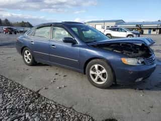 2006 Hyundai Azera SE z VIN KMHFC46F76A137195, wystawiony jako Copart lot #80076664 z przebiegiem 103 657 mil mil oraz Szkoda całkowita • Salvage title. Historia ofert i sprzedaży dostępna na DreamBid. Obrazek 4.