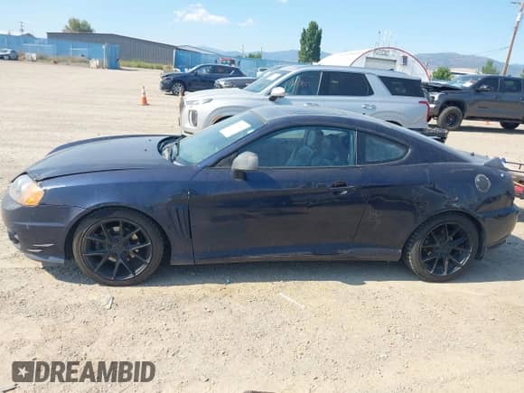 2004 Hyundai Tiburon GT с VIN KMHHN65F04U136207, выставлен на аукционе IAAI как лот 43035409 с пробегом Не указан миль и . История ставок и продаж доступна на DreamBid. Изображение 15.