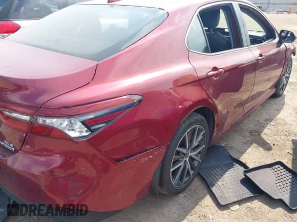 2021 Toyota Camry Hybrid XLE with VIN 4T1F31AK2MU548471, listed as a IAAI auction lot 42593756 with 48,076 mi miles and . Bid and sale history available at DreamBid. Image 4.