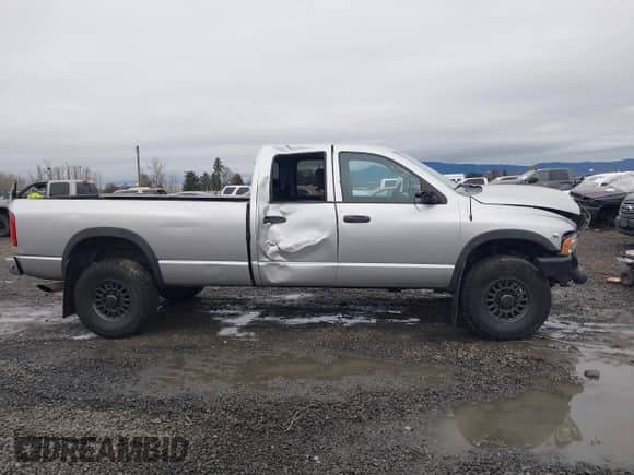 2004 Dodge 2500 SLT with VIN 3D7KU28C34G214012, listed as a IAAI auction lot 41837644 with 177,465 mi miles and . Bid and sale history available at DreamBid. Image 14.