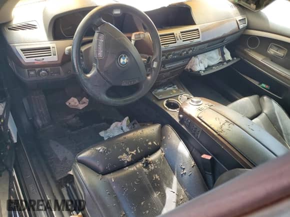 2006 BMW 7 Series 750Li с VIN WBAHN83596DT28087, выставлен на аукционе Copart как лот 66693715 с пробегом Не указан миль и Списание • Salvage title. История ставок и продаж доступна на DreamBid. Изображение 8.