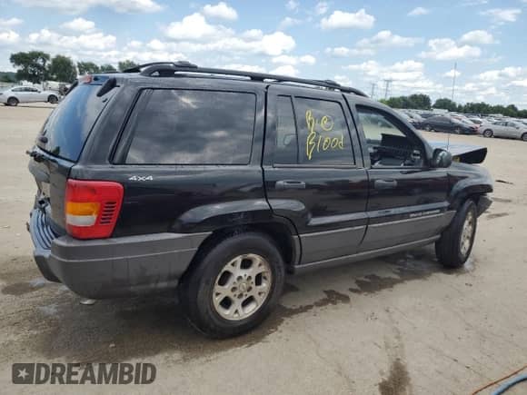 1999 Jeep Grand Cherokee Laredo с VIN 1J4GW58S4XC667706, выставлен на аукционе Copart как лот 63532705 с пробегом 150 656 миль миль и Списание • Salvage title. История ставок и продаж доступна на DreamBid. Изображение 3.