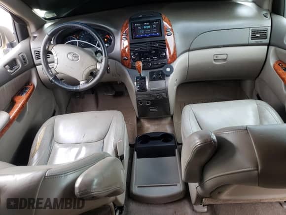 2006 Toyota Sienna XLE z VIN 5TDBA22C86S056444, wystawiony jako Copart lot #80984965 z przebiegiem 242 168 mil mil oraz Czysty tytuł • Clean title. Historia ofert i sprzedaży dostępna na DreamBid. Obrazek 8.