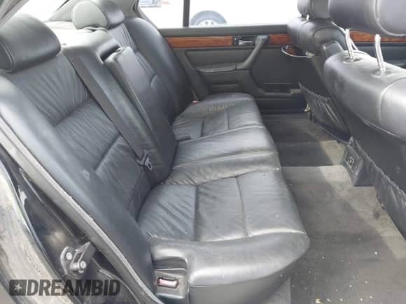 1994 BMW 7 Series with VIN WBAGD8327RDE91414, listed as a IAAI auction lot 42032344 with 138,313 mi miles and . Bid and sale history available at DreamBid. Image 8.