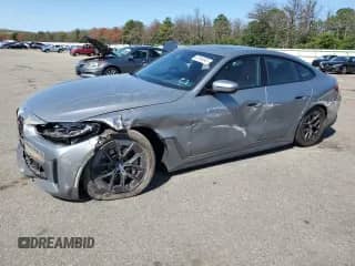 2023 BMW i4 eDrive35 with VIN WBY43AW0XPFR35585, listed as a Copart auction lot 67916045 with 24,598 mi miles and Salvage title. Bid and sale history available at DreamBid. Image 1.