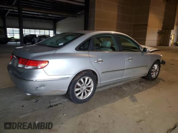 2007 Hyundai Azera SE с VIN KMHFC46F97A181619, выставлен на аукционе Copart как лот 82775754 с пробегом 198 730 миль миль и Списание • Salvage title. История ставок и продаж доступна на DreamBid. Изображение 3.