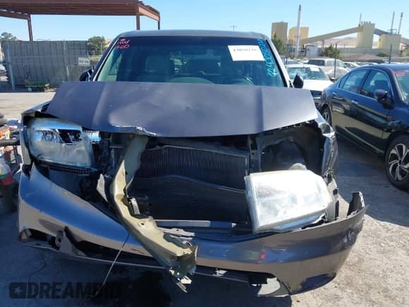 2015 Honda Pilot LX with VIN 5FNYF3H21FB015772, listed as a IAAI auction lot 43050238 with 145,107 mi miles and . Bid and sale history available at DreamBid. Image 13.