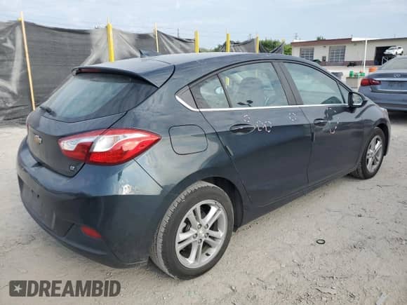 2017 Chevrolet Cruze LT с VIN 3G1BE6SM4HS566463, выставлен на аукционе Copart как лот 68772525 с пробегом 166 842 миль миль и Списание • Salvage title. История ставок и продаж доступна на DreamBid. Изображение 3.