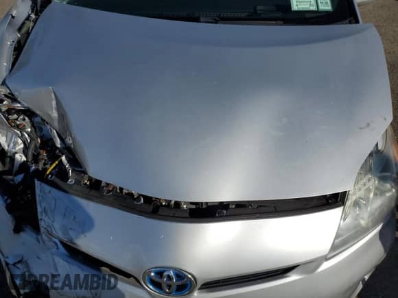 2015 Toyota Prius Four z VIN JTDKN3DUXF1894861, wystawiony jako Copart lot #89679235 z przebiegiem Nie podano mil oraz Szkoda całkowita • Salvage title. Historia ofert i sprzedaży dostępna na DreamBid. Obrazek 11.