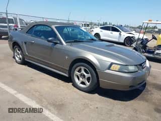2001 Ford Mustang Deluxe with VIN 1FAFP44471F171133, listed as a IAAI auction lot 42478246 with 162,791 mi miles and . Bid and sale history available at DreamBid. Image 1.