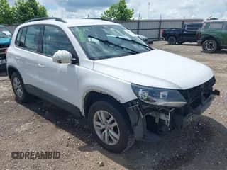 2017 Volkswagen Tiguan S with VIN WVGAV7AX3HK018868, listed as a IAAI auction lot 42606072 with Not provided miles and . Bid and sale history available at DreamBid. Image 1.