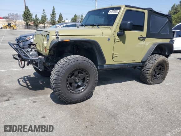 2013 Jeep Wrangler Rubicon with VIN 1C4HJWCGXDL535465, listed as a Copart auction lot 61093865 with 108,691 mi miles and Salvage title. Bid and sale history available at DreamBid. Image 1.