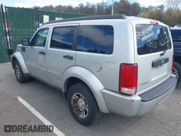 2011 Dodge Nitro SE with VIN 1D4PU2GKXBW508467, listed as a IAAI auction lot 42061484 with 100,295 mi miles and . Bid and sale history available at DreamBid. Image 3.