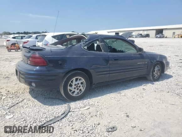 2001 Pontiac Grand Am с VIN 1G2NF12E71M523159, выставлен на аукционе Copart как лот 69371714 с пробегом 190 820 миль миль и Чистый • Clean title. История ставок и продаж доступна на DreamBid. Изображение 3.