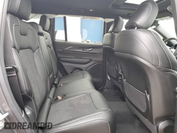 2025 Jeep Grand Cherokee Laredo with VIN 1C4RJHAG4SC272275, listed as a Copart auction lot 79920004 with 712 mi miles and Salvage title. Bid and sale history available at DreamBid. Image 11.
