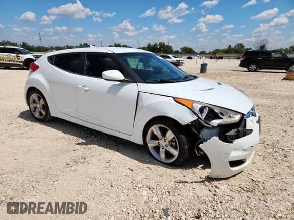 2014 Hyundai Veloster z VIN KMHTC6ADXEU211730, wystawiony jako Copart lot #71236595 z przebiegiem 107 121 mil mil oraz Szkoda całkowita • Salvage title. Historia ofert i sprzedaży dostępna na DreamBid. Obrazek 4.