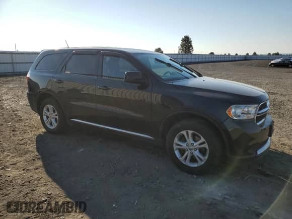 2013 Dodge Durango SXT with VIN 1C4RDJAG8DC680991, listed as a Copart auction lot 81775025 with 164,117 mi miles and Salvage title. Bid and sale history available at DreamBid. Image 4.