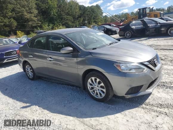 2019 Nissan Sentra S с VIN 3N1AB7AP9KY215939, выставлен на аукционе Copart как лот 86335305 с пробегом 182 131 миль миль и Чистый • Clean title. История ставок и продаж доступна на DreamBid. Изображение 4.