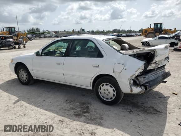 1997 Toyota Camry LE with VIN 4T1BG22K2VU793201, listed as a Copart auction lot 59761015 with 267,258 mi miles and Non repairable. Bid and sale history available at DreamBid. Image 2.