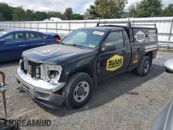 2012 Chevrolet Colorado with VIN 1GBGSBFE2C8157062, listed as a Copart auction lot 69809394 with 146,370 mi miles and Salvage title. Bid and sale history available at DreamBid. Image 1.