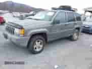 1996 Jeep Grand Cherokee with VIN 1J4EZ58S1TC112995, listed as a IAAI auction lot 41706966 with 356,727 mi miles and . Bid and sale history available at DreamBid. Image 2.