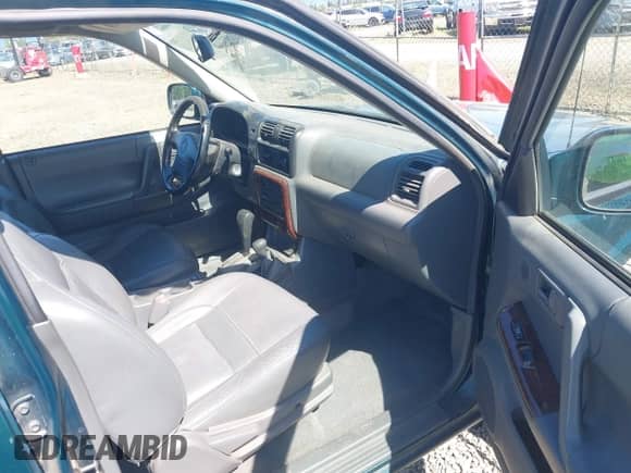 1998 Honda Passport LX with VIN 4S6CM58W0W4407344, listed as a IAAI auction lot 42201105 with 254,317 mi miles and . Bid and sale history available at DreamBid. Image 5.