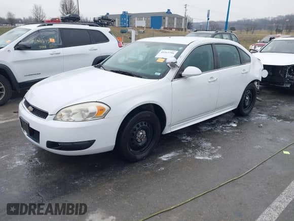 2013 Chevrolet Impala Police with VIN 2G1WD5E35D1222227, listed as a IAAI auction lot 41163786 with 176,742 mi miles and . Bid and sale history available at DreamBid. Image 19.