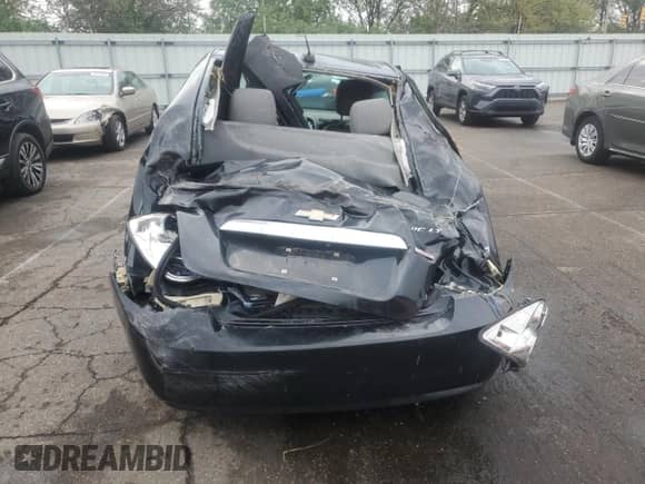 2015 Chevrolet Sonic LTZ с VIN 1G1JE5SB1F4130638, выставлен на аукционе Copart как лот 84034965 с пробегом Не указан миль и Списание • Salvage title. История ставок и продаж доступна на DreamBid. Изображение 6.