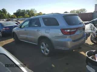 2014 Dodge Durango Limited with VIN 1C4RDJDG3EC443757, listed as a Copart auction lot 71530125 with 77,973 mi miles and Salvage title. Bid and sale history available at DreamBid. Image 2.