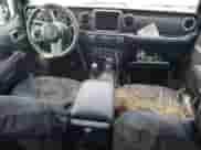 2023 Jeep Wrangler Sahara с VIN 1C4JJXP67PW605290, выставлен на аукционе Copart как лот 85527815 с пробегом Не указан миль и На запчасти • Non repairable. История ставок и продаж доступна на DreamBid. Изображение 8.