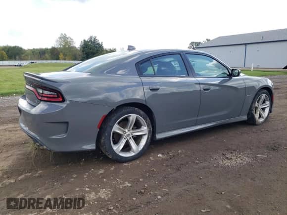 2018 Dodge Charger R/T with VIN 2C3CDXCT3JH323220, listed as a Copart auction lot 84239515 with 79,828 mi miles and Salvage title. Bid and sale history available at DreamBid. Image 3.