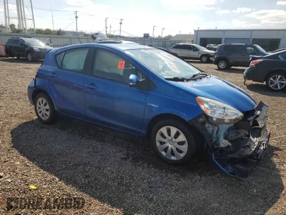 2014 Toyota Prius One with VIN JTDKDTB32E1571402, listed as a Copart auction lot 71623825 with 63,399 mi miles and Salvage title. Bid and sale history available at DreamBid. Image 4.