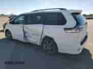 2015 Toyota Sienna SE Premium with VIN 5TDXK3DC5FS687755, listed as a Copart auction lot 86972295 with 228,550 mi miles and Salvage title. Bid and sale history available at DreamBid. Image 2.