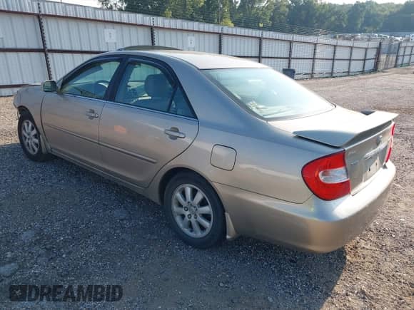 2002 Toyota Camry XLE с VIN JTDBF32K520012087, выставлен на аукционе IAAI как лот 43166714 с пробегом 111 936 миль миль и . История ставок и продаж доступна на DreamBid. Изображение 3.