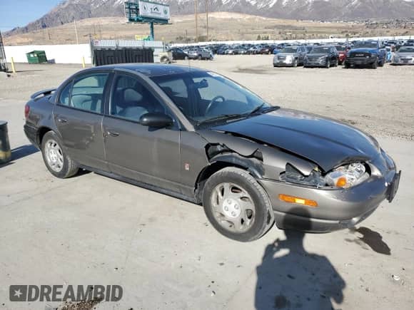 2000 Saturn SL with VIN 1G8ZK5276YZ227493, listed as a Copart auction lot 48172835 with 105,806 mi miles and Salvage title. Bid and sale history available at DreamBid. Image 4.