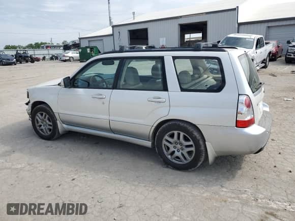 2007 Subaru Forester X L.L. Bean with VIN JF1SG67617H703254, listed as a Copart auction lot 59336545 with 121,540 mi miles and Salvage title. Bid and sale history available at DreamBid. Image 2.