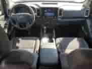 2024 Nissan Frontier SV with VIN 1N6ED1FK9RN659197, listed as a Copart auction lot 80124795 with 20,167 mi miles and Salvage title. Bid and sale history available at DreamBid. Image 8.