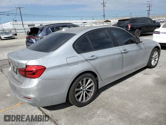 2018 BMW 3 Series 320i with VIN WBA8A9C50JAH13343, listed as a Copart auction lot 70562555 with 110,990 mi miles and Salvage title. Bid and sale history available at DreamBid. Image 3.