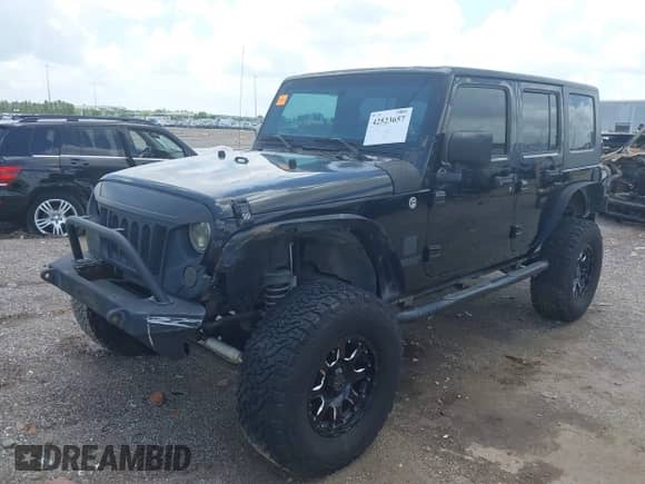 2008 Jeep Wrangler Unlimited X z VIN 1J4GA39148L560004, wystawiony jako IAAI lot #42523657 z przebiegiem 116 619 mil mil oraz . Historia ofert i sprzedaży dostępna na DreamBid. Obrazek 2.