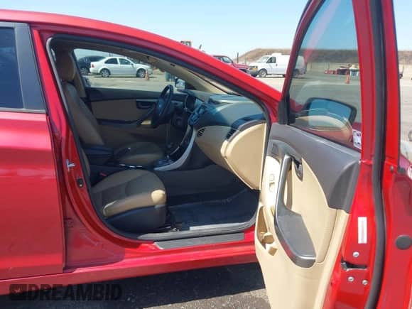 2013 Hyundai Elantra GLS with VIN KMHDH4AE6DU945833, listed as a IAAI auction lot 42392294 with 126,709 mi miles and . Bid and sale history available at DreamBid. Image 5.