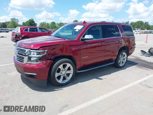 2016 Chevrolet Tahoe LTZ z VIN 1GNSKCKC8GR256797, wystawiony jako IAAI lot #42624002 z przebiegiem 133 490 mil mil oraz . Historia ofert i sprzedaży dostępna na DreamBid. Obrazek 2.