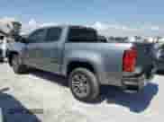 2021 Chevrolet Colorado 2WD Work Truck с VIN 1GCGSBEA4M1153163, выставлен на аукционе Copart как лот 57791375 с пробегом 47 561 миль миль и На запчасти • Non repairable. История ставок и продаж доступна на DreamBid. Изображение 2.